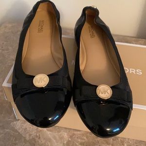 Michael Kors flats.